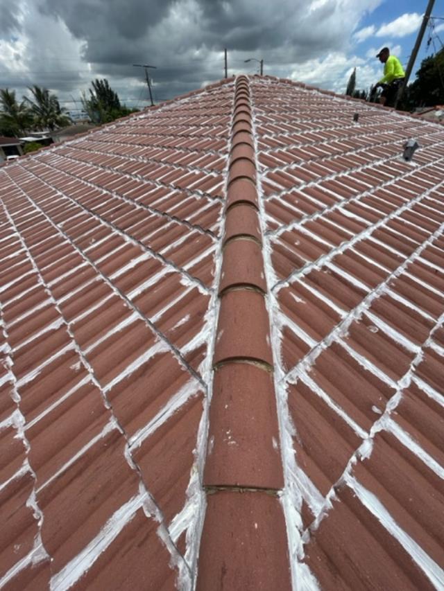 Roof Shield preparation — filling open valleys between tiles with coating
