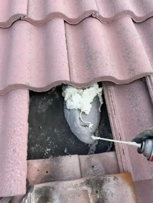 Roof tile repair in progress — fiber coat pointing applied — Smart Shield | The Roof Store Roof tile repair in progress — fiber coat pointing applied